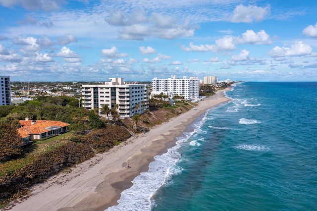 drone / aerial view with a view of the beach and a water view