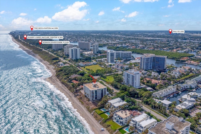 bird's eye view with a water view and a view of the beach