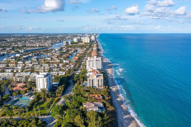 bird's eye view with a water view and a view of the beach