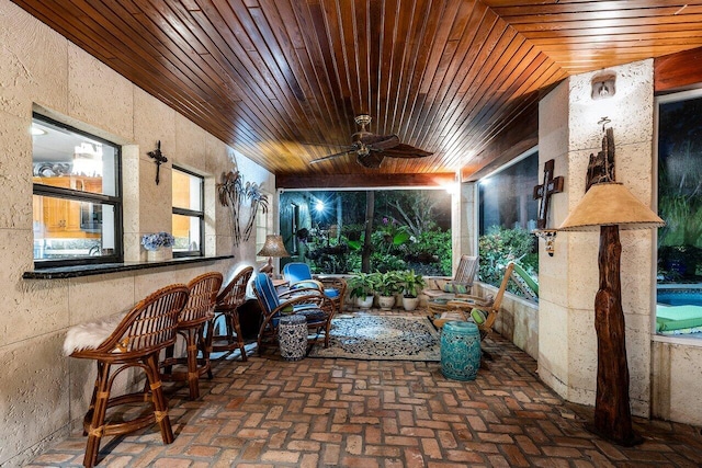 view of patio featuring ceiling fan