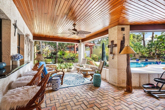 view of patio / terrace featuring ceiling fan