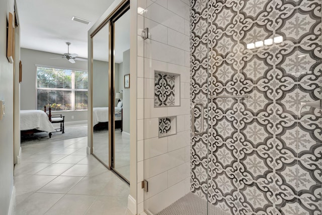 bathroom featuring tile patterned flooring and ceiling fan