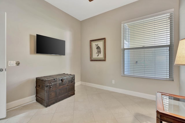 living area with light tile patterned floors