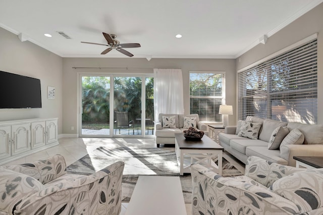 tiled living room featuring ceiling fan and ornamental molding