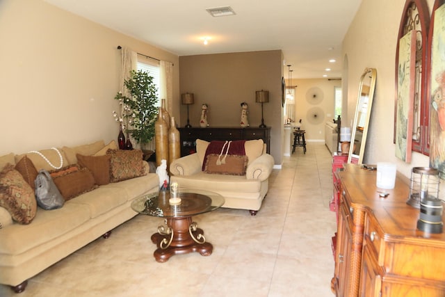 living room featuring light tile patterned floors