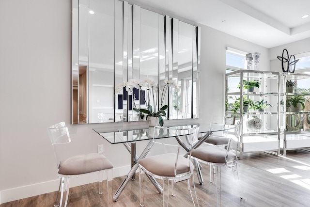 dining area with hardwood / wood-style floors