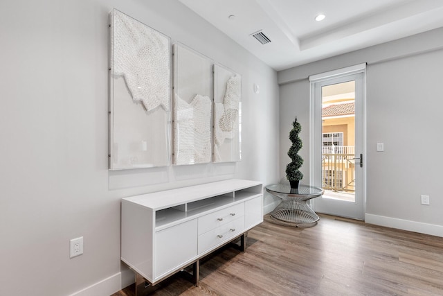 mudroom with light hardwood / wood-style floors