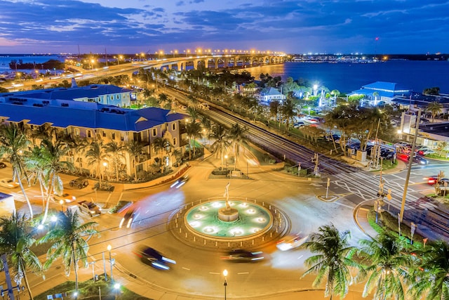 aerial view at dusk with a water view