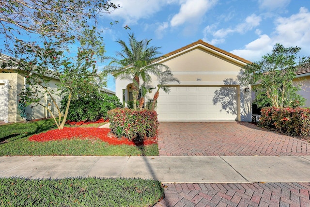 view of front of property with a garage