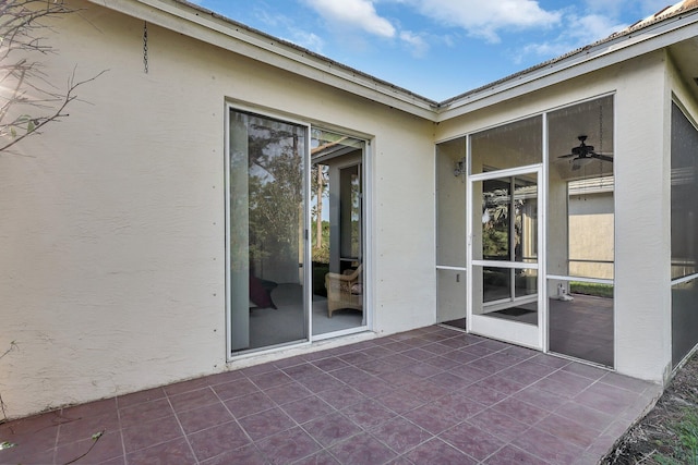 view of patio / terrace featuring ceiling fan