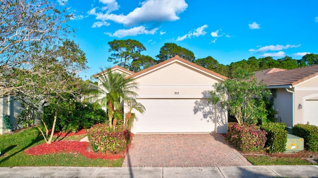 ranch-style home with a garage