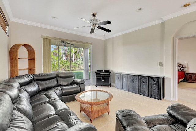 living room featuring light tile patterned floors and ornamental molding