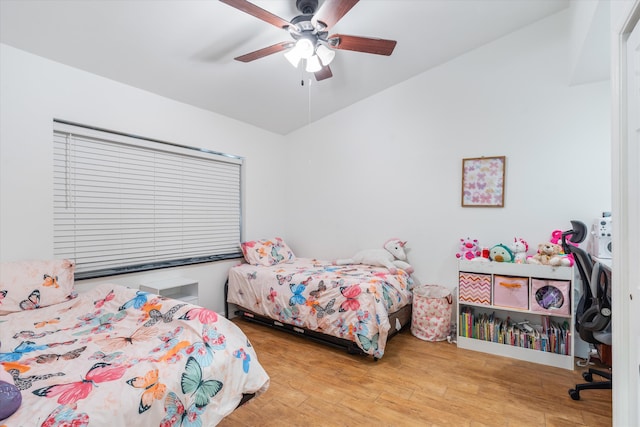 bedroom featuring ceiling fan and light hardwood / wood-style floors