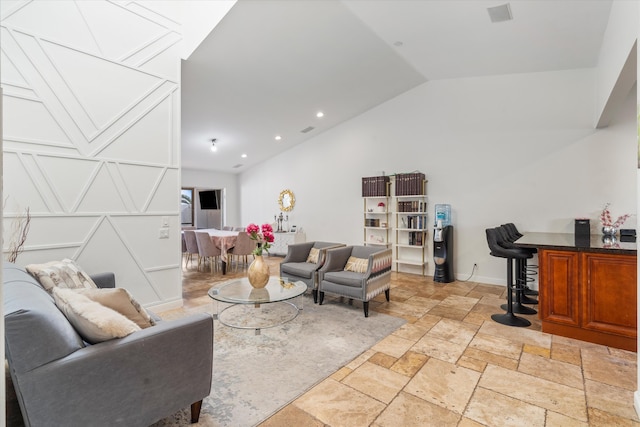 living room with vaulted ceiling