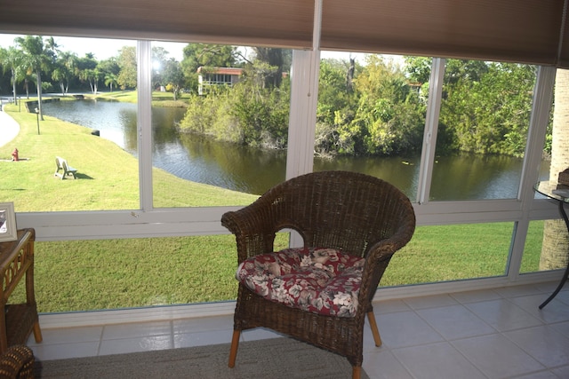 sunroom with a water view