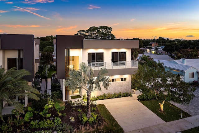 contemporary home with a balcony