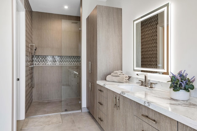 bathroom with vanity and an enclosed shower