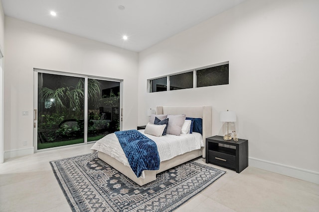 bedroom with light tile patterned floors