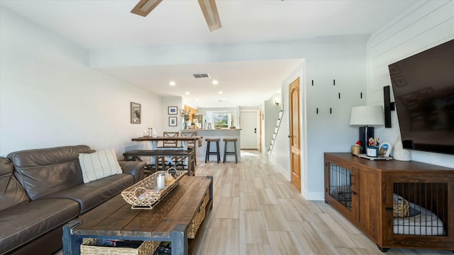 living room with light hardwood / wood-style floors