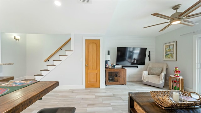 living room featuring ceiling fan