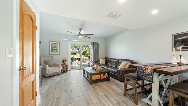 living room with ceiling fan