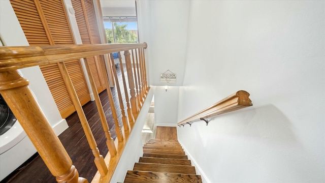 stairs with wood-type flooring