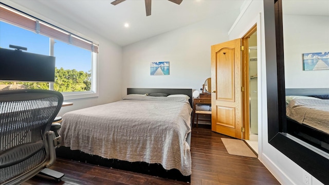 bedroom featuring ceiling fan, dark wood-type flooring, and vaulted ceiling