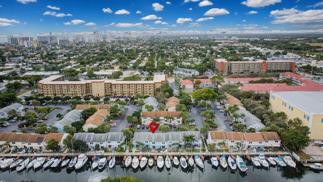 birds eye view of property featuring a water view