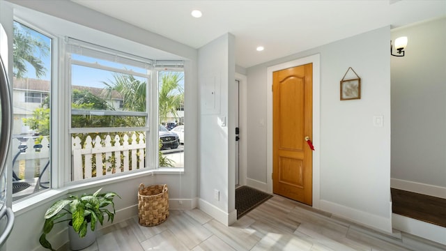 doorway with light hardwood / wood-style floors