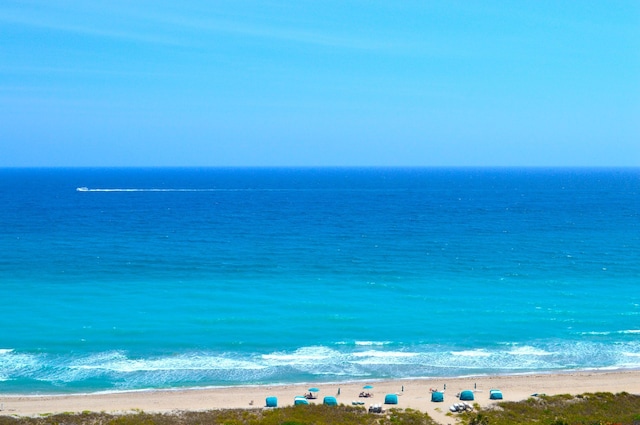 view of water feature with a beach view