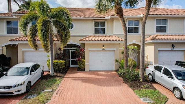 view of front of property featuring a garage