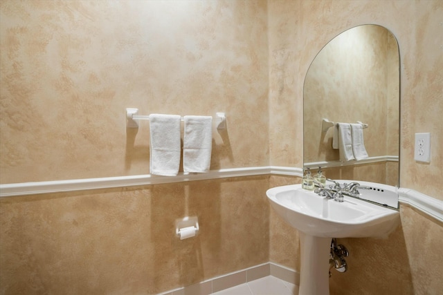 bathroom with tile patterned flooring