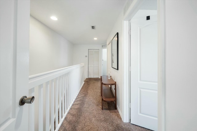 hallway featuring carpet