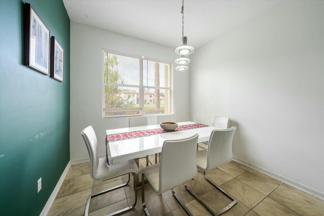 dining room with light tile patterned floors