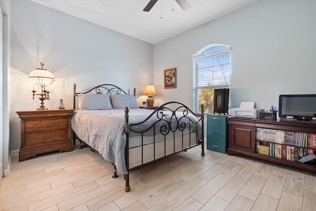 bedroom with ceiling fan and light wood-type flooring