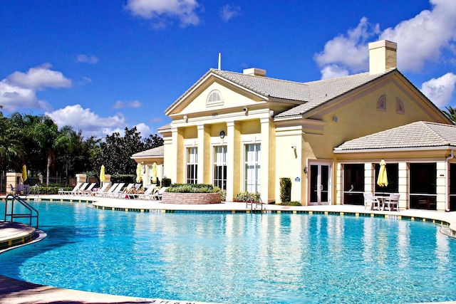 view of swimming pool featuring a patio