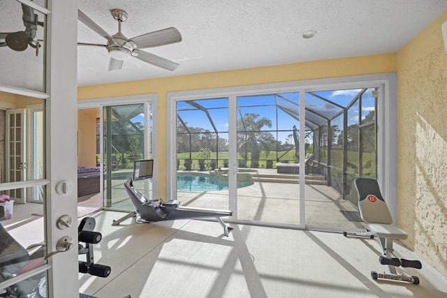 workout area with ceiling fan