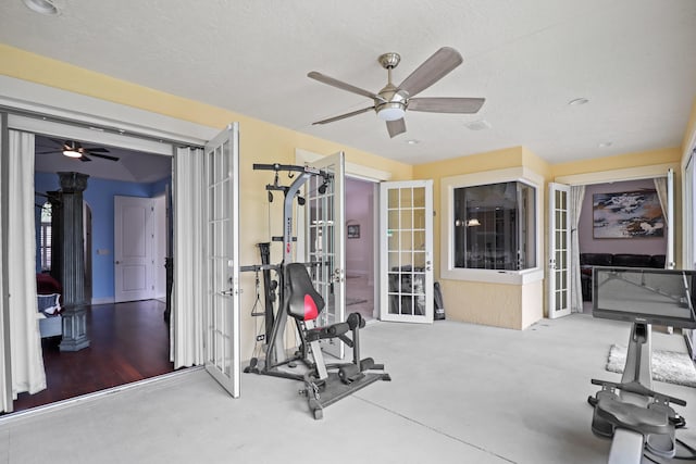 exercise room featuring hardwood / wood-style floors, ceiling fan, a textured ceiling, and french doors