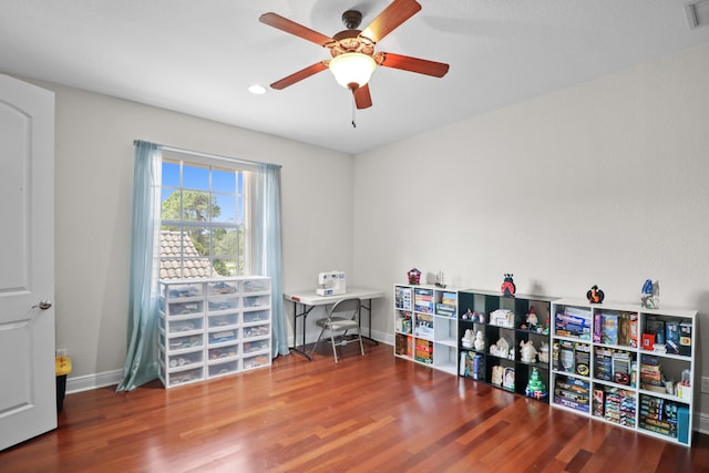 miscellaneous room featuring hardwood / wood-style flooring and ceiling fan