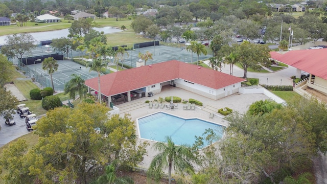 birds eye view of property featuring a water view