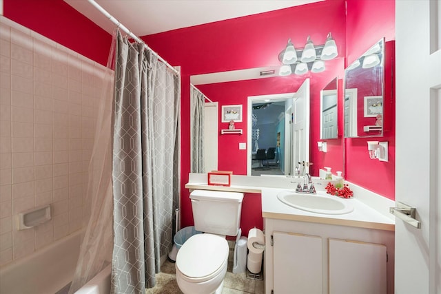 full bathroom with vanity, shower / bath combination with curtain, and toilet