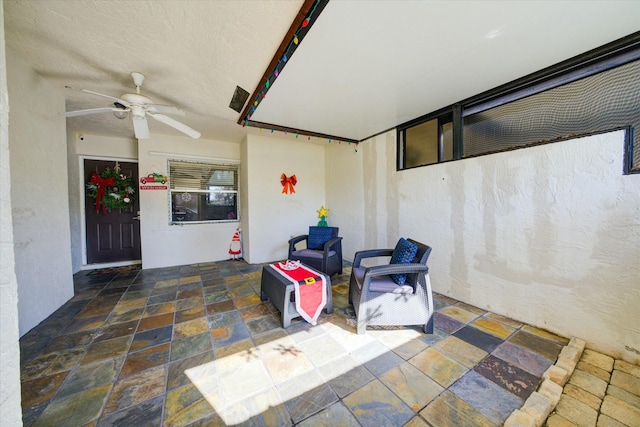 view of patio / terrace with ceiling fan