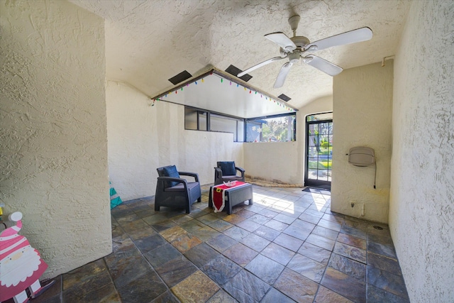 view of patio with ceiling fan