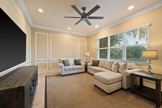 living room featuring crown molding and ceiling fan