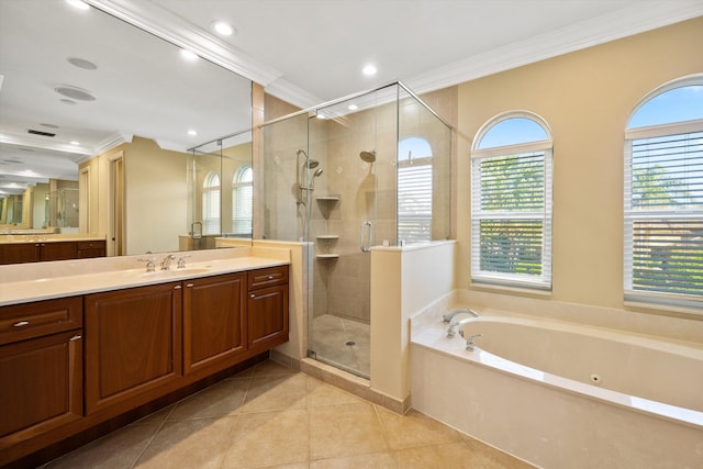 bathroom featuring crown molding, vanity, separate shower and tub, and tile patterned flooring