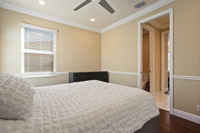 bedroom featuring wood-type flooring, ornamental molding, and ceiling fan