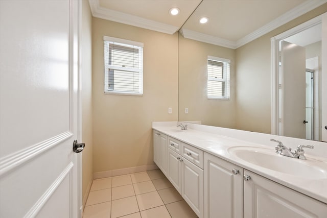 bathroom featuring crown molding, tile patterned floors, and vanity