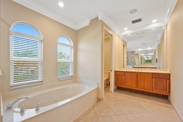 bathroom with toilet, crown molding, vanity, a bathing tub, and tile patterned flooring