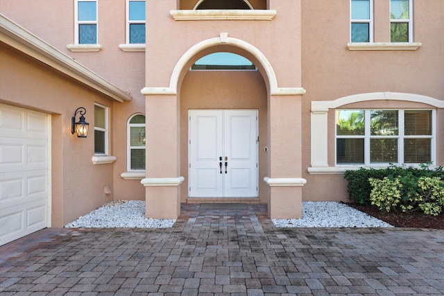 entrance to property featuring a garage