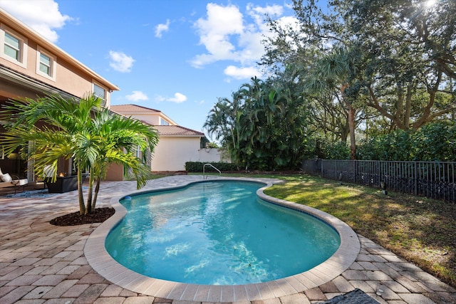 view of pool featuring a patio